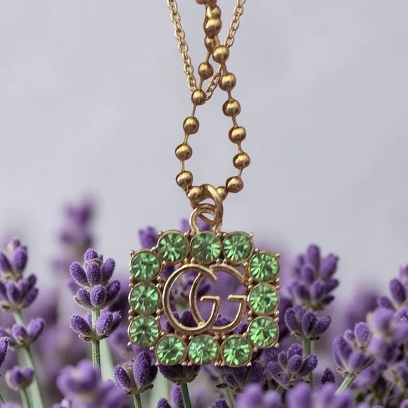 Gucci Gold-Tone up cycled GG Pendant Necklace with Green Crystals - Picture 1 of 5